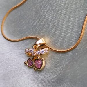 Stone Bow with two heart falling apart